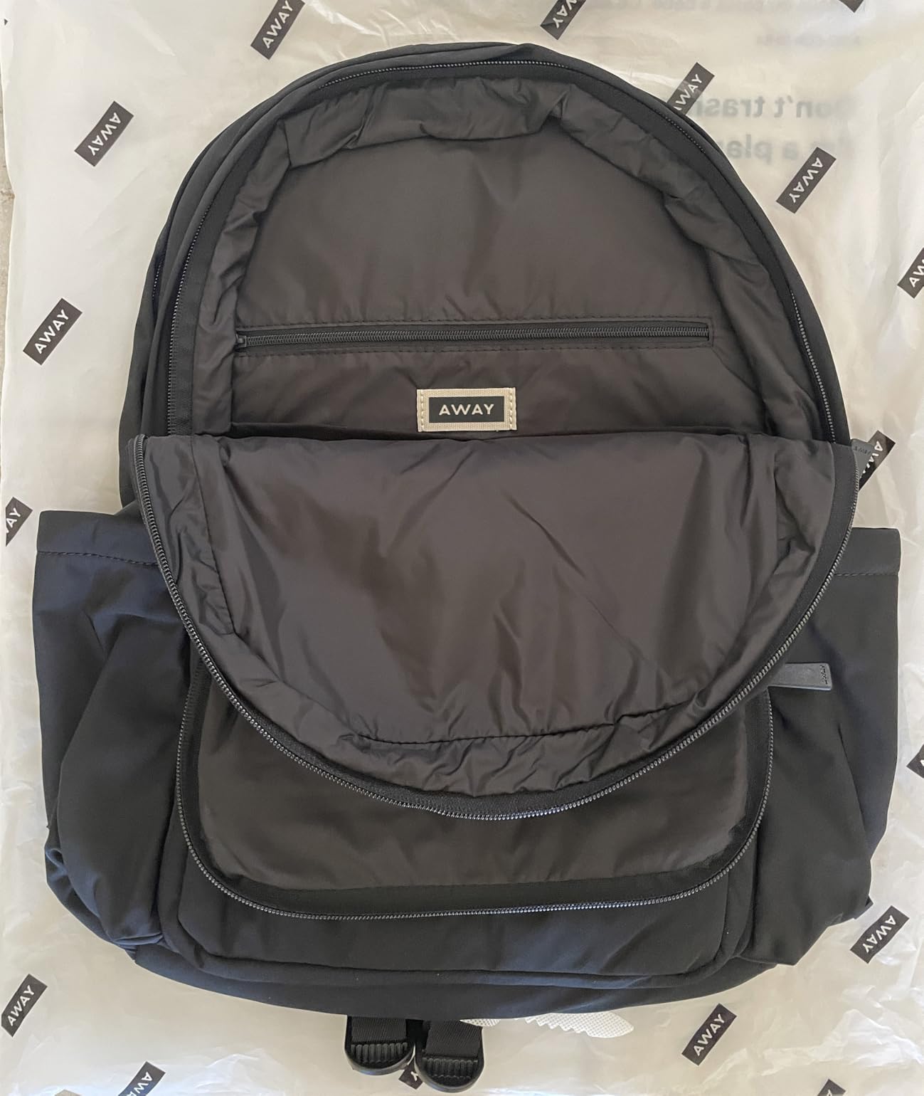 Away Featherlight Large Backpack for Travel and Work - Ergonomic Lightweight Bag with 16 Inch Laptop Sleeve, Passport Pocket and Trolley Sleeve, Jet Black customer photo 1