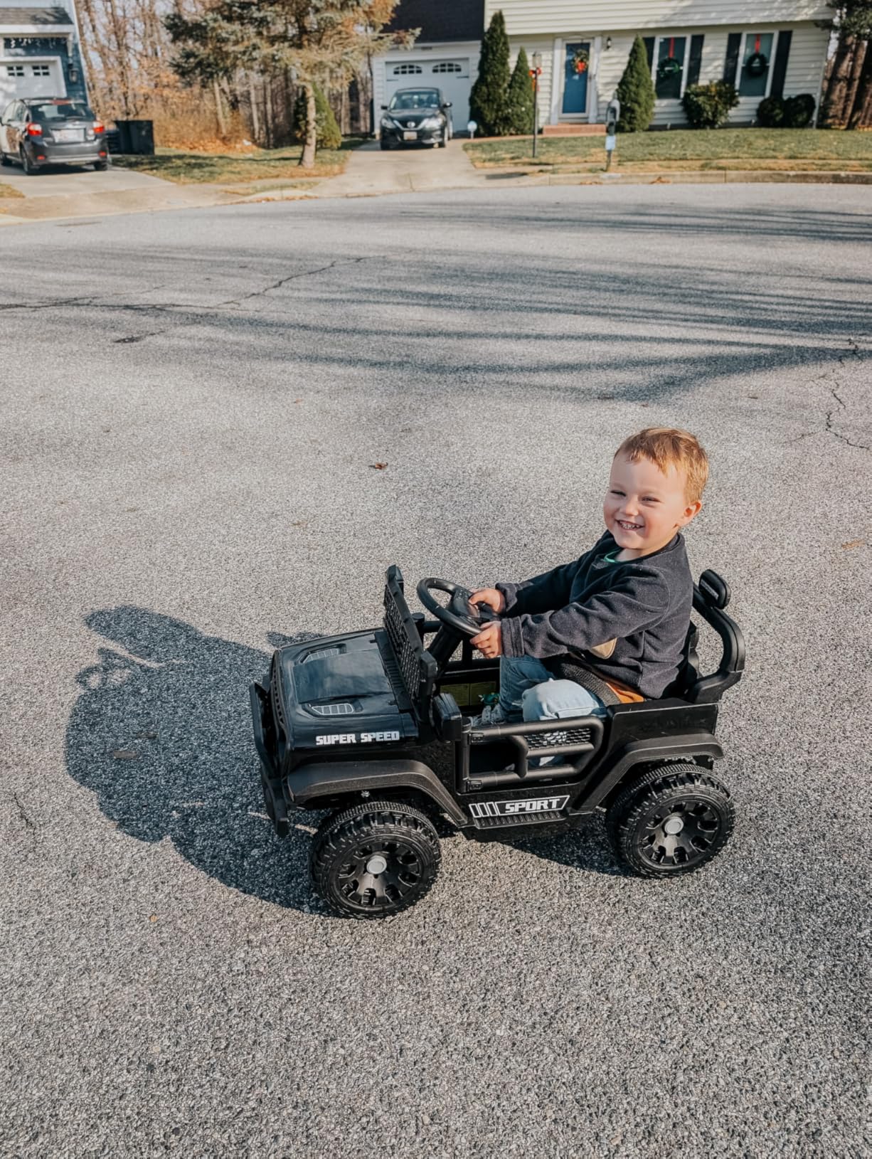 12V Ride on Car with Parent Remote Control, Toddler Electric Car with Spring Suspension, LED Lights & Music Player - Safe Battery Toy for Kids, Christmas & Birthday Gift, Black customer photo 2