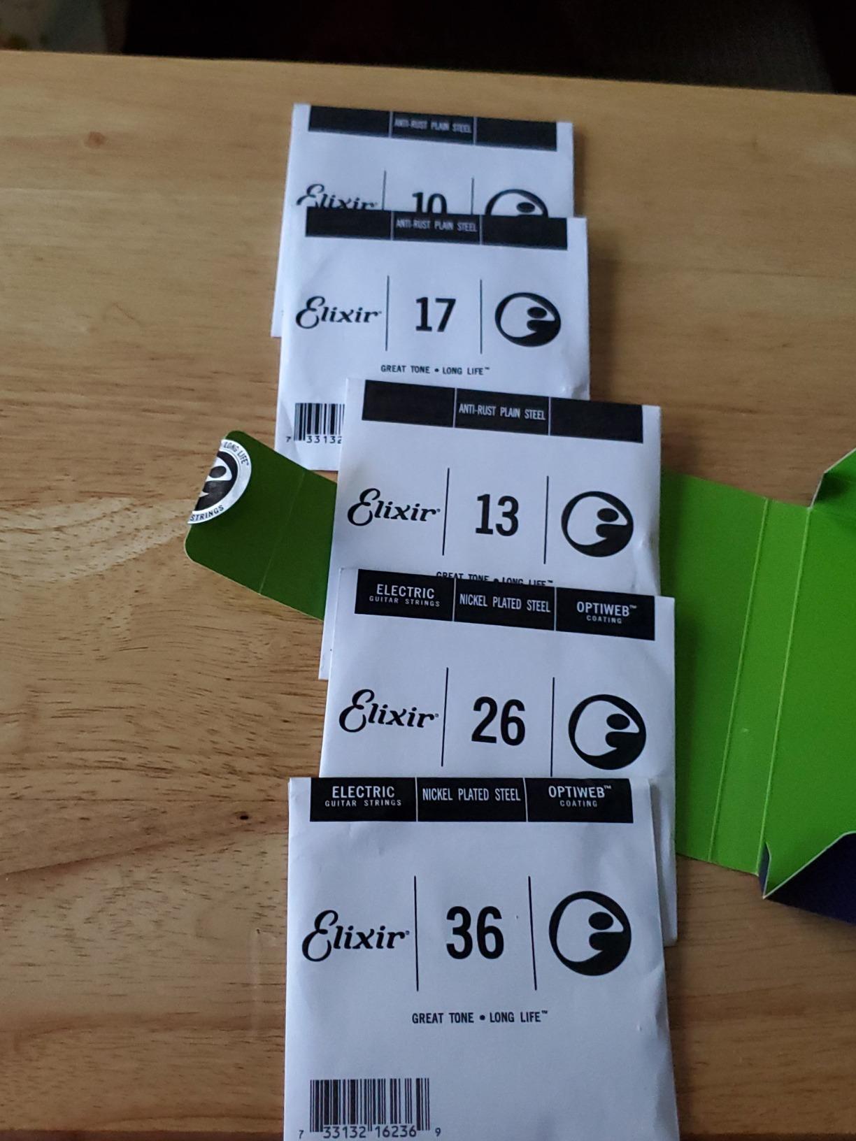 Elixir Strings, Electric Guitar Strings, Nickel Plated Steel with OPTIWEB Technology, Light 10-46 customer photo 1