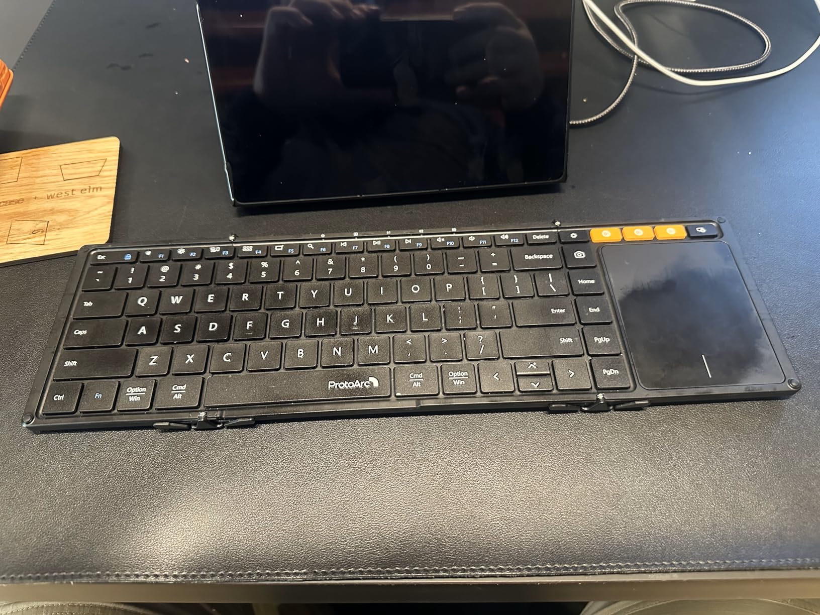 ProtoArc Foldable Keyboard with Touchpad, XK01 TP Folding Portable Keyboard, Full Size Keys, Large Trackpad Bluetooth Travel Keyboards for Laptop PC Tablet - Black customer photo 1
