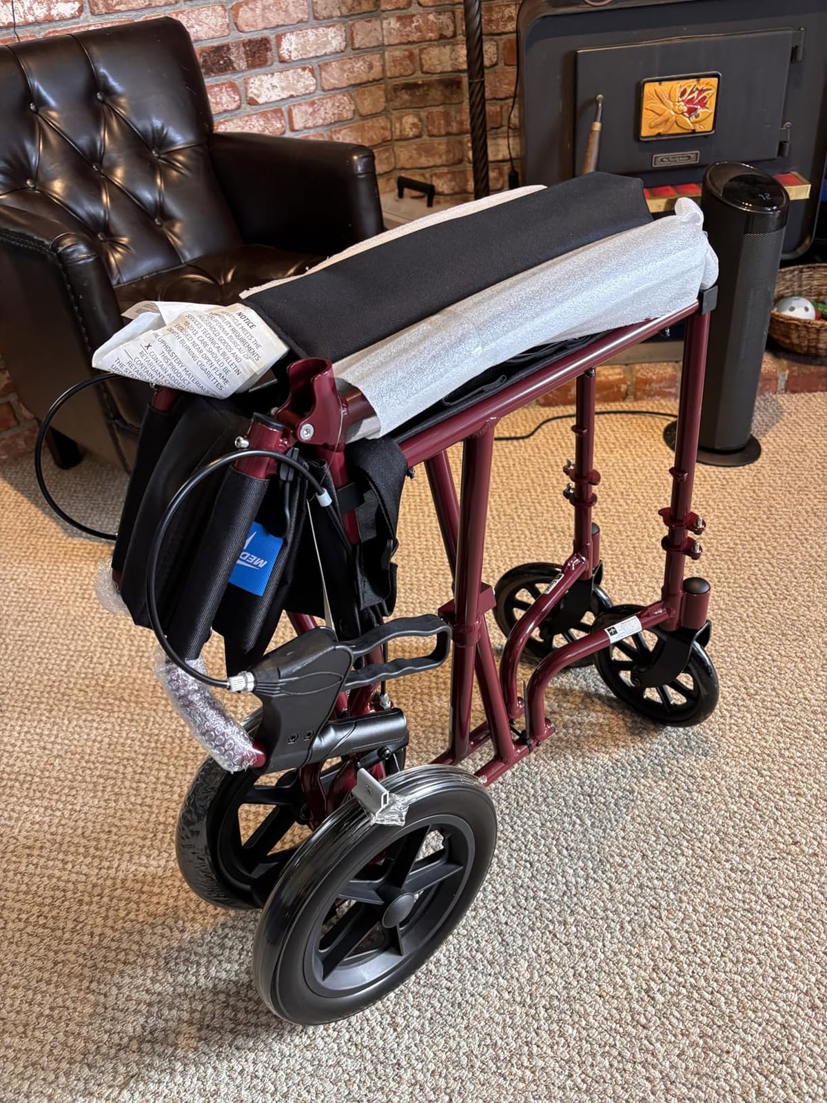 Medline Lightweight Foldable Transport Wheelchair with Handbrakes and 12-Inch Wheels, Blue Frame, Black Upholstery customer photo 2
