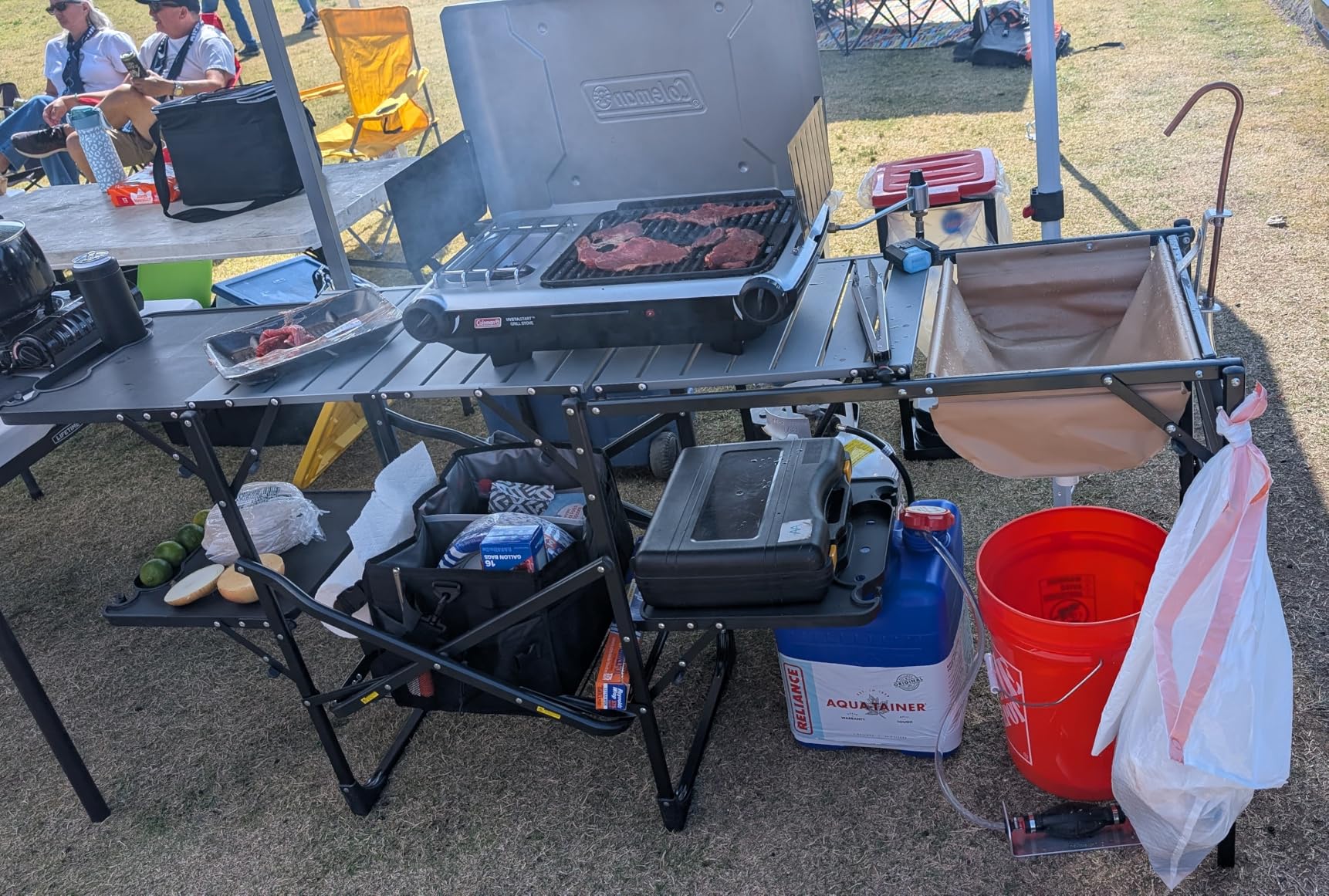GCI OUTDOOR Slim-Fold Cook Station | Portable Folding Kitchen Table with a Heat Resistant Tabletop, 4 Side Tables & Storage Rack, Perfect for Picnics & Camping Trips customer photo 2