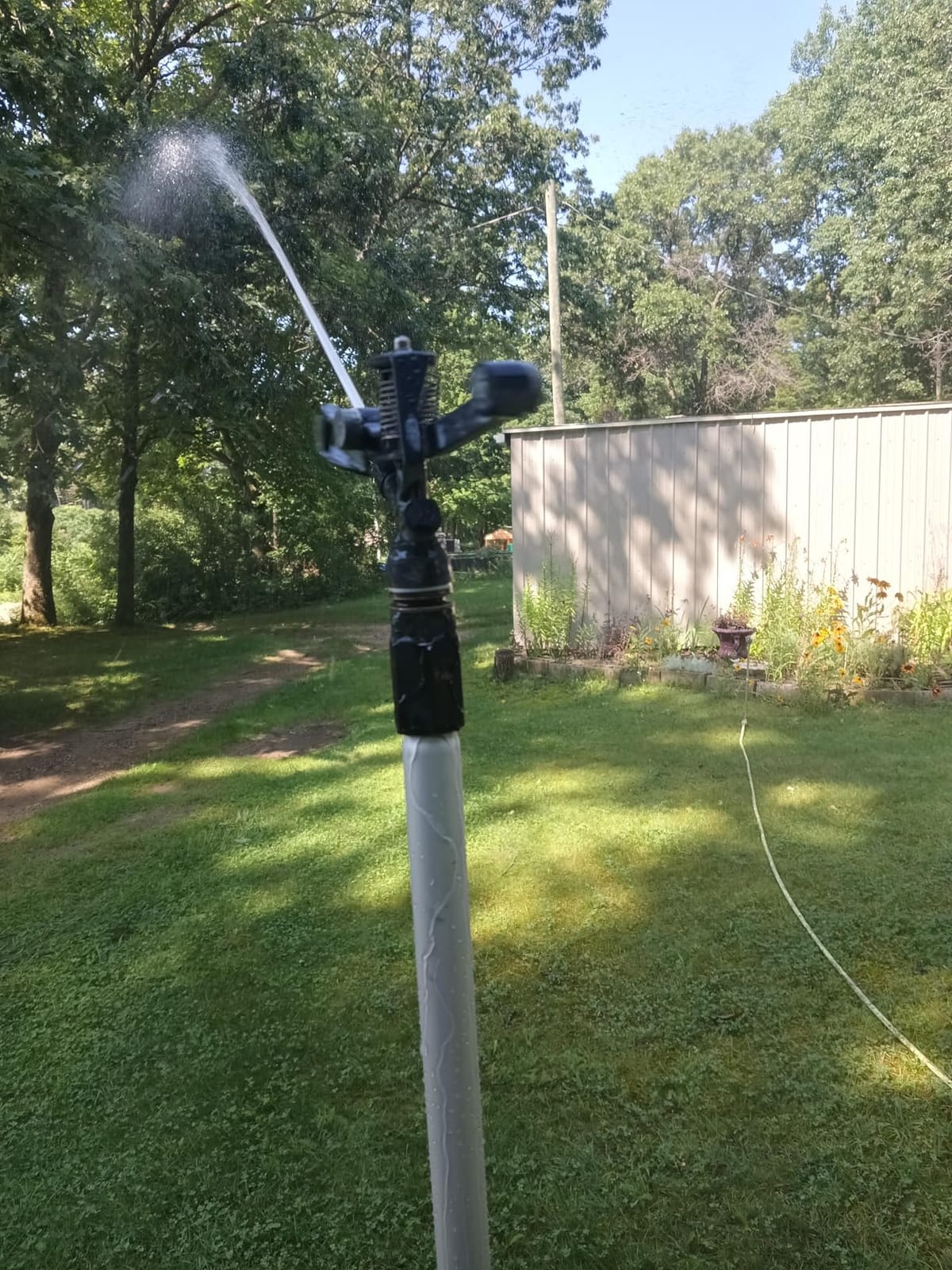 Heavy Duty Tripod Sprinkler 300003, Long Range Sprinkler with 100 FT Reach, 6 Feet Adjustable Tripod Height, 360° Range Control, for Farm, Lawn, Field, Orchard Irrigation by New England Garden Tools customer photo 1