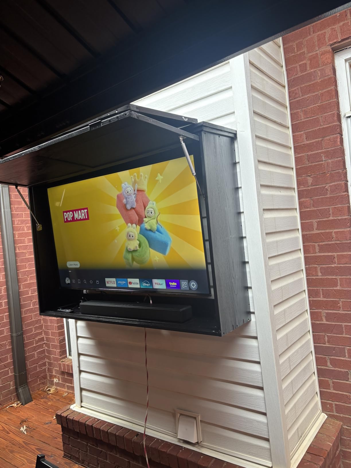 GDLF Outdoor TV Enclosure for 44-55 Inch TVs with Dual-Arm Mount | Solid wood construction, black finish, and a fold-up front suit covered patios, decks, and sheltered entertainment areas customer photo 1