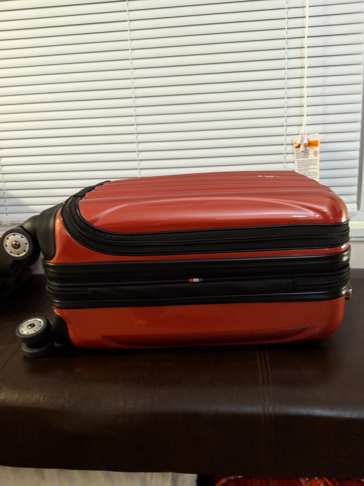 DELSEY PARIS Helium Aero Hardside Expandable Luggage with Spinner Wheels, Brick Red, Carry-On Plus 21 Inch customer photo 1