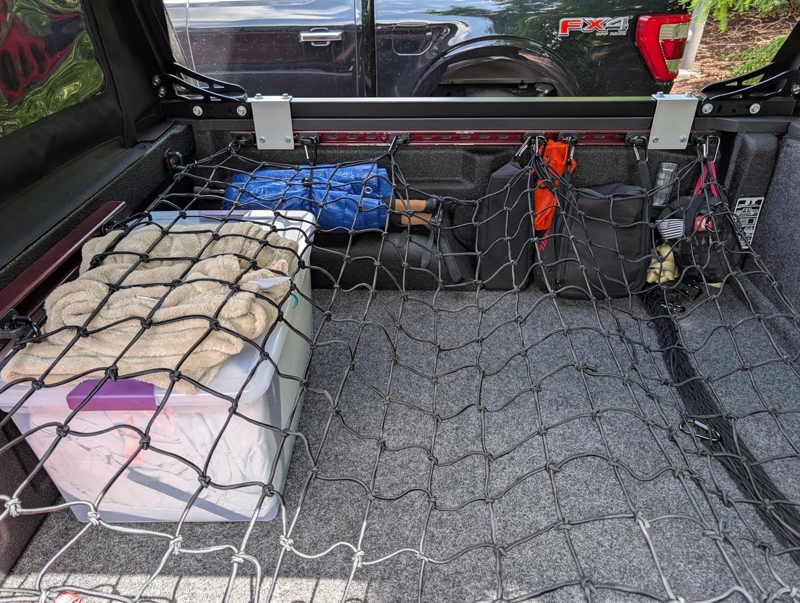 Truck Bed Cargo Net – 4 x 6 Foot, Heavy-Duty Elastic Mesh with 12 Black Clips and Storage Bag for Pickup for Cargo Netting, Securing Loads in Trailers, SUVs & Roof Racks customer photo 1
