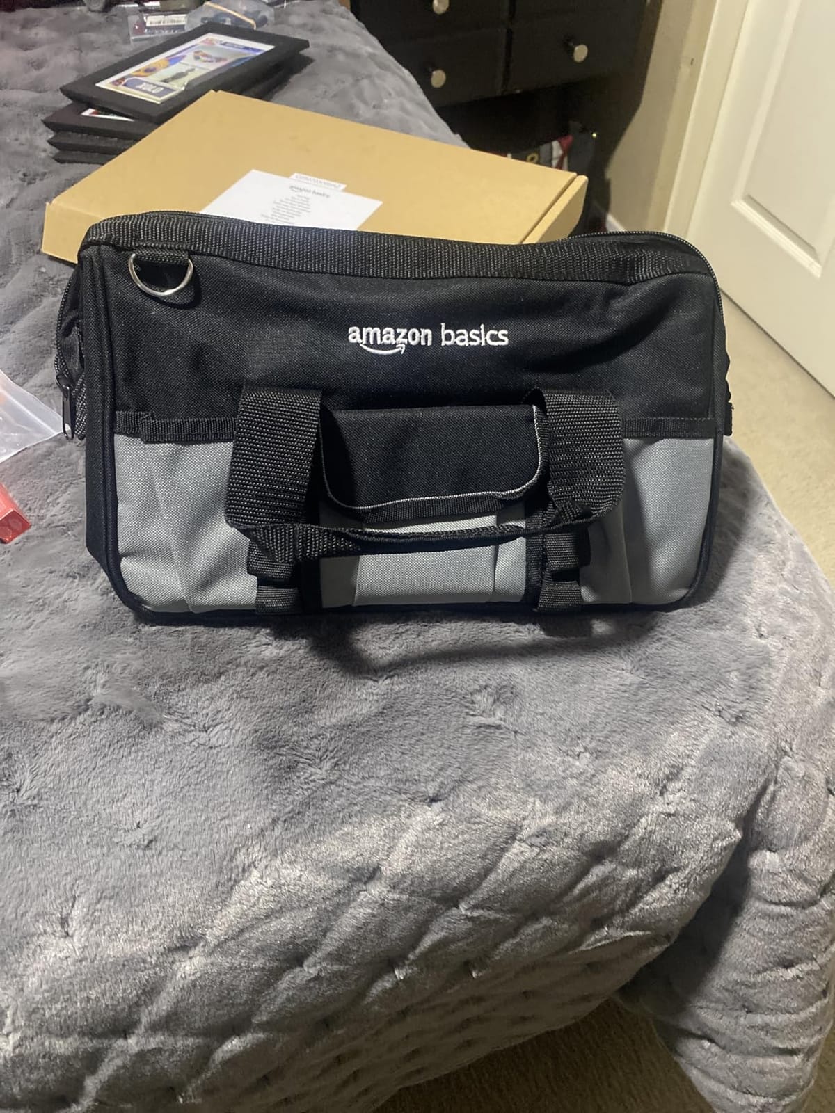 Amazon Basics Durable Wear-Resistant Tool Storage Bag with Adjustable Shoulder Strap, Portable Tool Organizer, 16 in, Black & Grey customer photo 1
