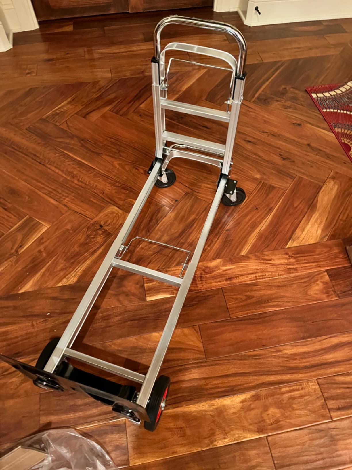 Suzhi Foldable Hand Truck Moving Dolly Cart with 4 Wheels, 500 Lbs Load,2 Straps, Pre-Assembled, Save Room, Easy Folding Dolly for Furniture, Appliances, Boxes, Warehouse & Office Transport customer photo 2