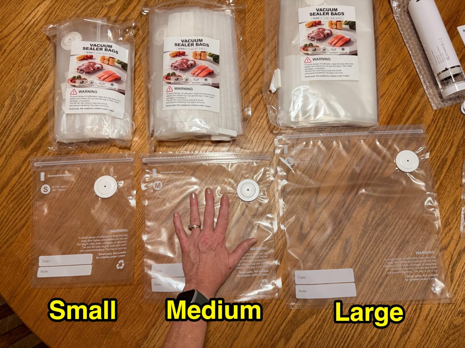 Compact Handheld Vacuum Sealer for Food with 45 Reusable Vacuum Bags customer photo 1